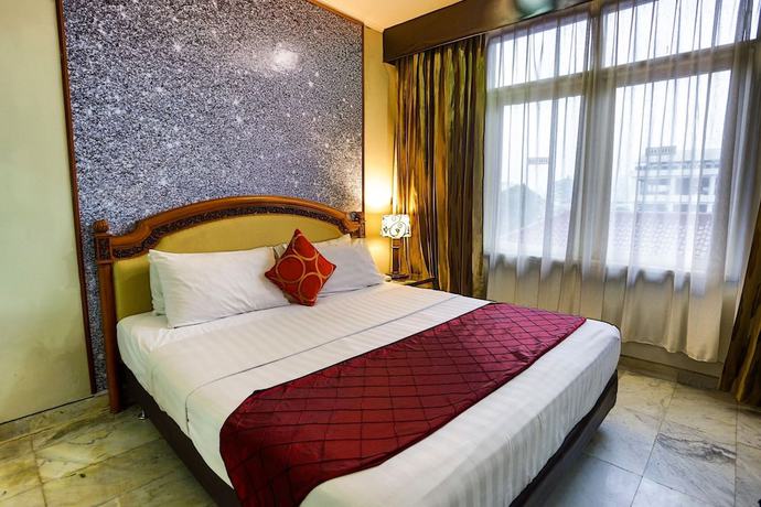 Imagen de la habitación del Hotel Johns Pardede International. Foto 15