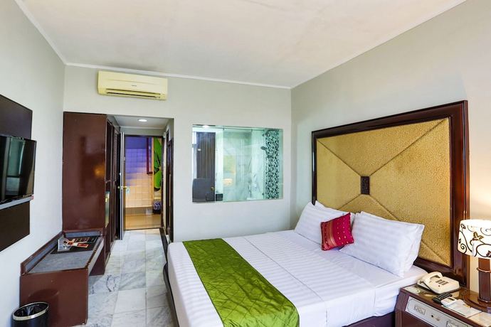 Imagen de la habitación del Hotel Johns Pardede International. Foto 16