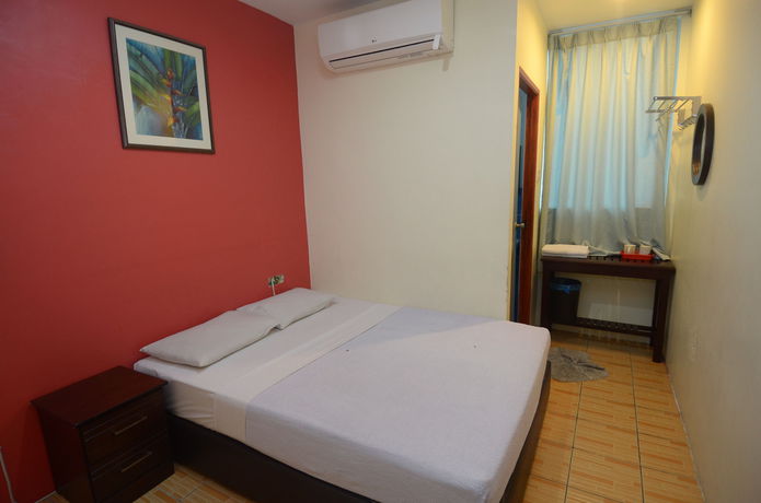 Imagen de la habitación del Hotel John's Place. Foto 12