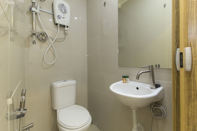 Imagen de la habitación del Hotel Johnshun. Foto 7