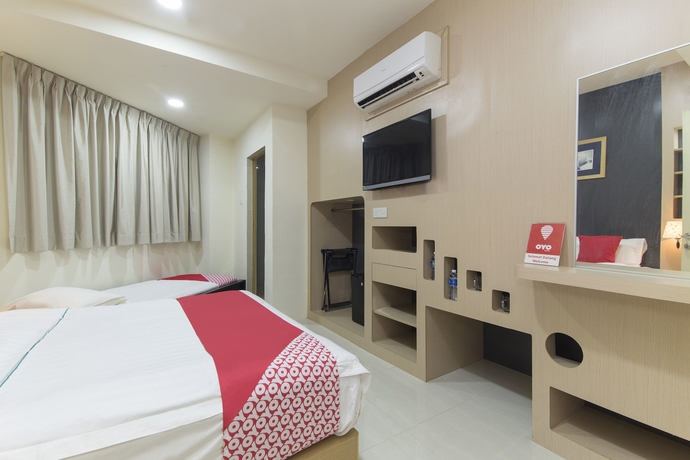 Imagen de la habitación del Hotel Johnshun. Foto 12