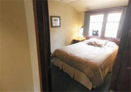Imagen de la habitación del Hotel Johnston Canyon Lodge & Bungalows. Foto 6