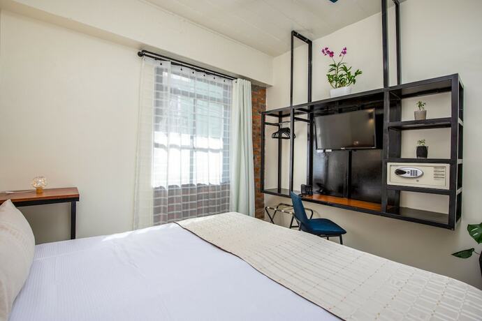 Imagen de la habitación del Hotel Joint Boutique. Foto 13