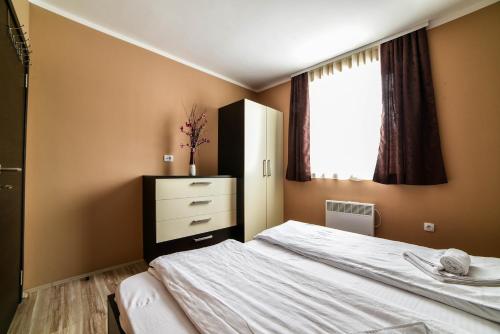 Imagen de la habitación del Hotel JollyKop Apartments. Foto 6