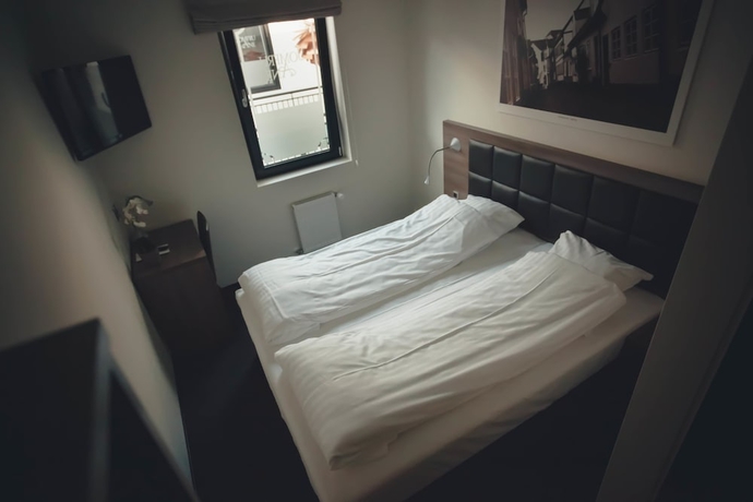 Imagen de la habitación del Hotel Jomfru Ane. Foto 17