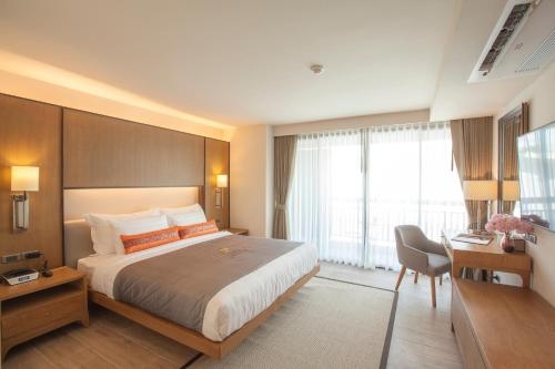 Imagen de la habitación del Hotel Jomkitti Boutique. Foto 6