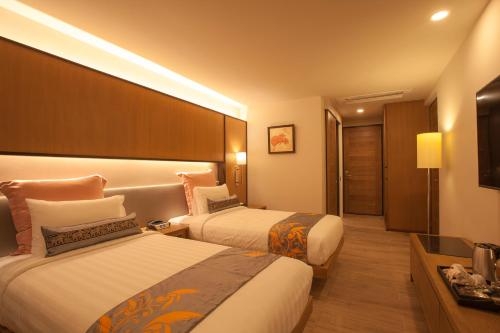 Imagen de la habitación del Hotel Jomkitti Boutique. Foto 8