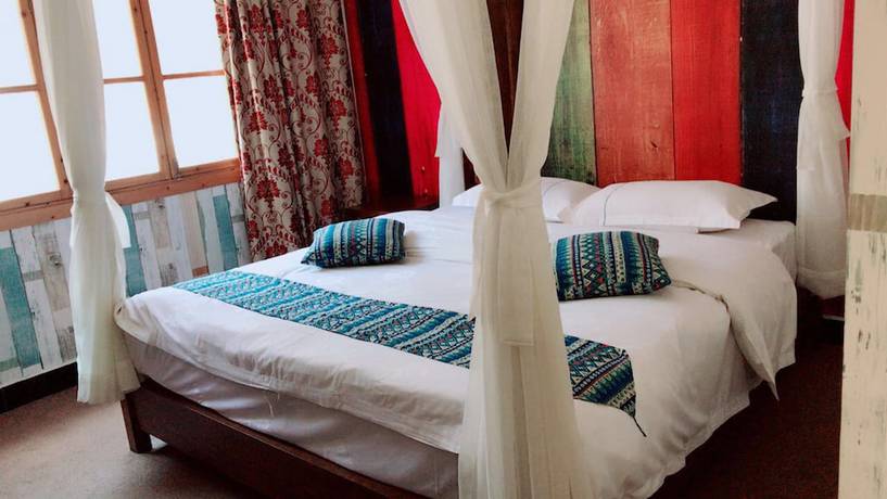 Imagen de la habitación del Hotel Jomo Fenghuang. Foto 3