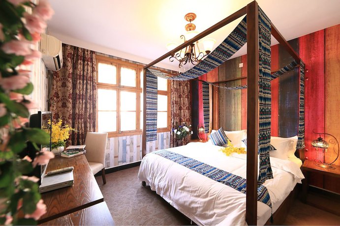 Imagen de la habitación del Hotel Jomo Fenghuang. Foto 4