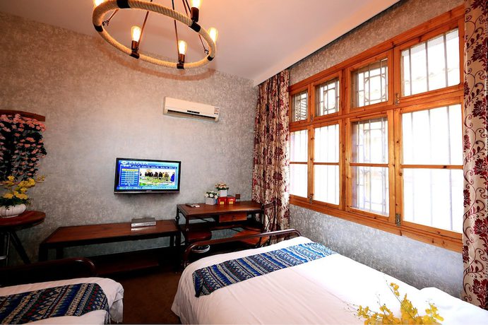 Imagen de la habitación del Hotel Jomo Fenghuang. Foto 5