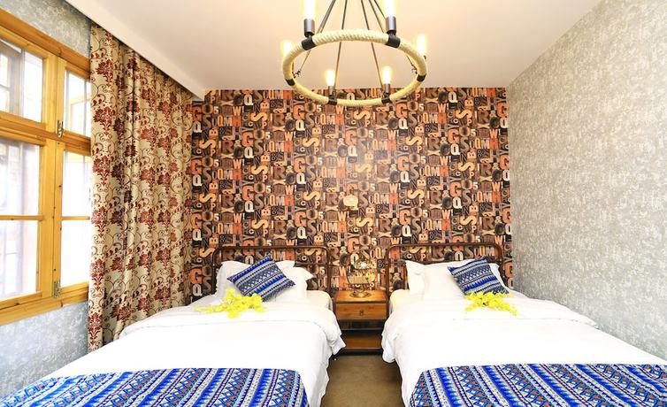 Imagen de la habitación del Hotel Jomo Fenghuang. Foto 7