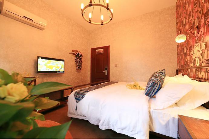 Imagen de la habitación del Hotel Jomo Fenghuang. Foto 10