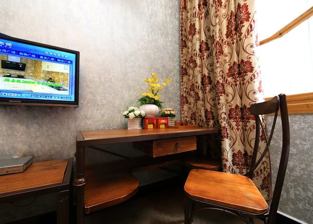 Imagen de la habitación del Hotel Jomo Fenghuang. Foto 12