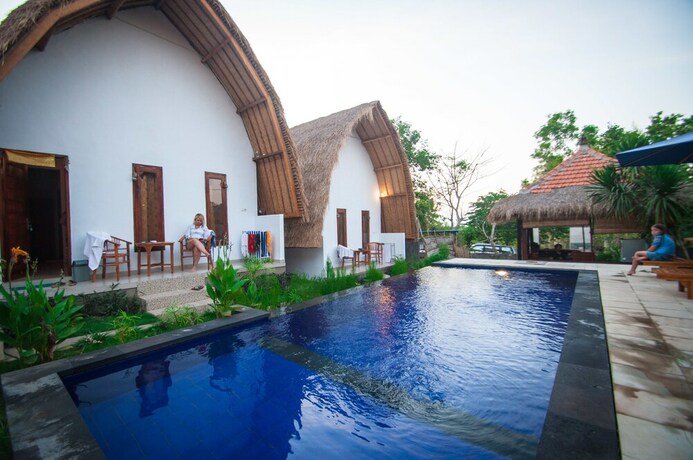 Imagen de la habitación del Hotel Jona Bungalow. Foto 17