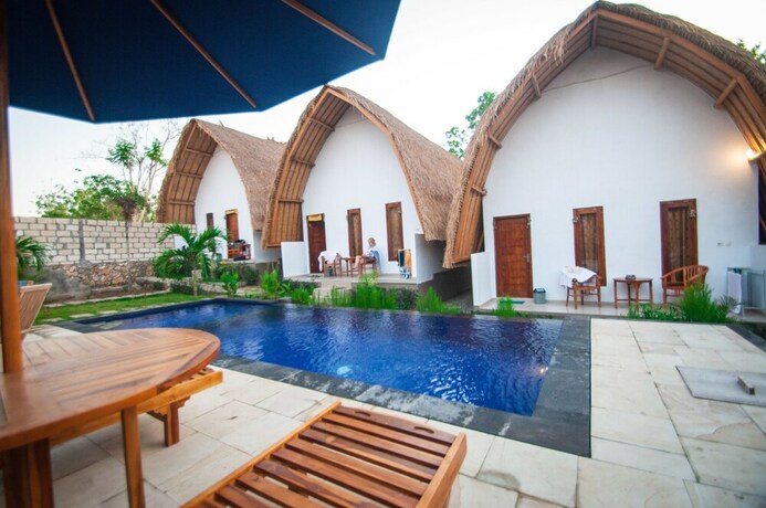 Imagen de la habitación del Hotel Jona Bungalow. Foto 25