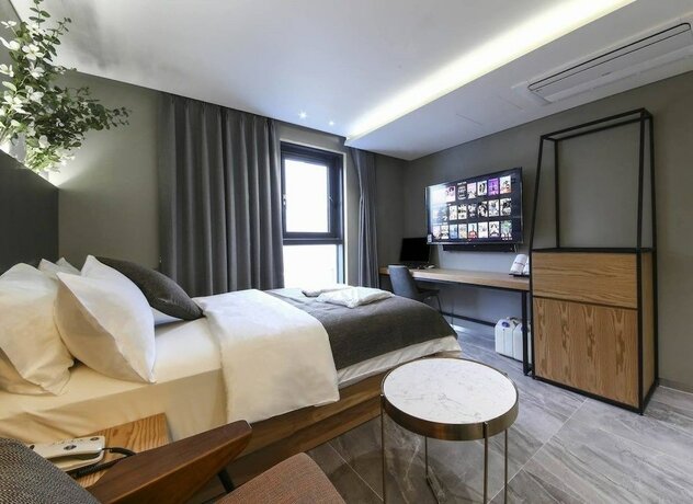 Imagen de la habitación del Hotel Jongno The Post. Foto 17