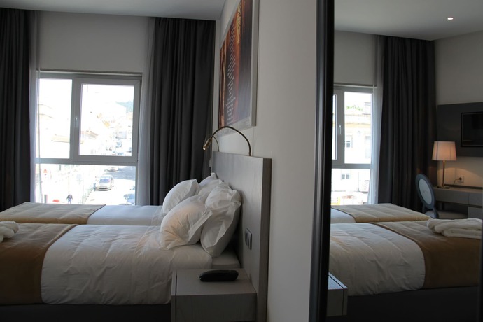 Imagen de la habitación del Hotel José Régio. Foto 11