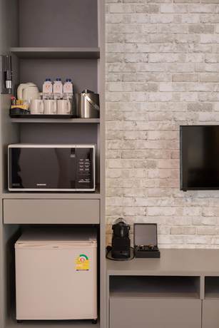 Imagen de la habitación del Hotel Journeyhub Pattaya Central. Foto 8