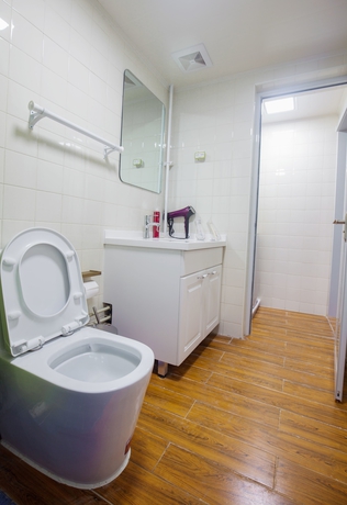 Imagen de la habitación del Hotel Joy Apartment Beijing. Foto 4