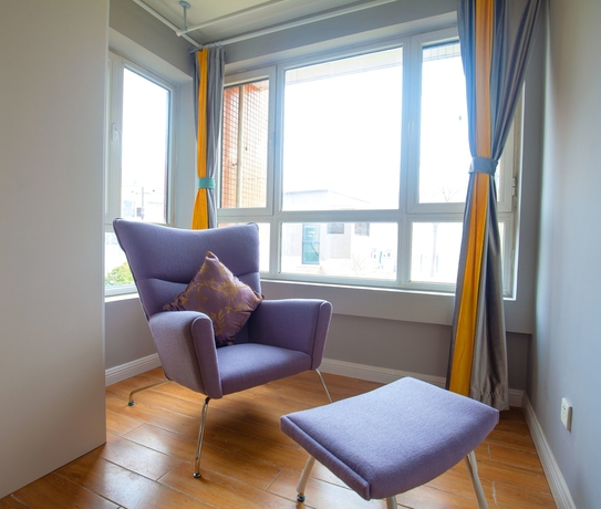 Imagen de la habitación del Hotel Joy Apartment Beijing. Foto 5