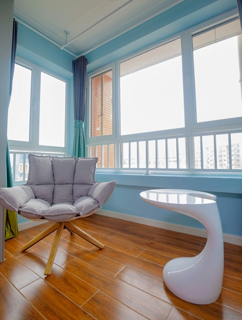 Imagen de la habitación del Hotel Joy Apartment Beijing. Foto 7