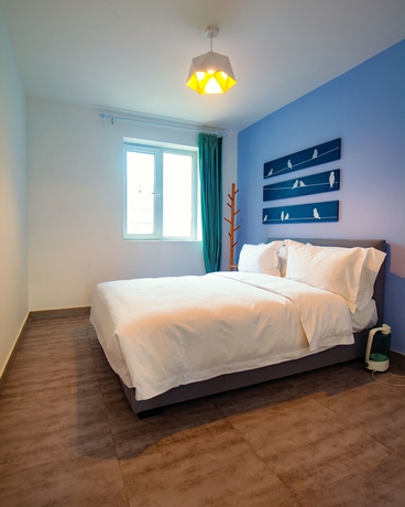 Imagen de la habitación del Hotel Joy Apartment Beijing. Foto 17