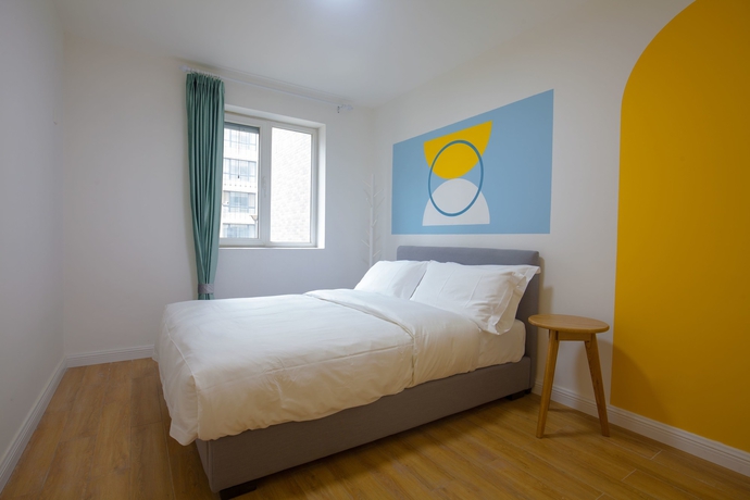 Imagen de la habitación del Hotel Joy Apartment Beijing. Foto 18