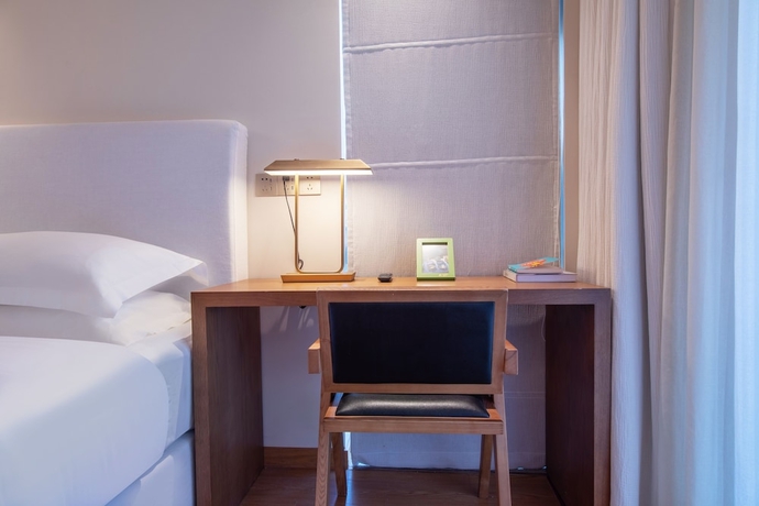 Imagen de la habitación del Hotel Joy Holiday Lijiang. Foto 1