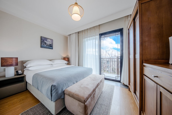 Imagen de la habitación del Hotel Joy Holiday Lijiang. Foto 2