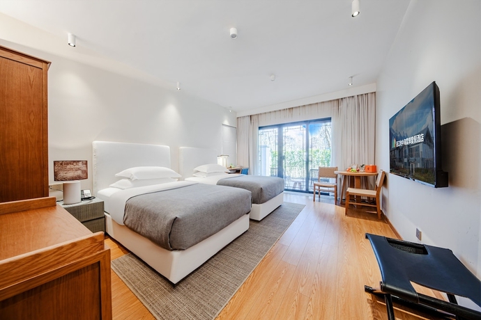 Imagen de la habitación del Hotel Joy Holiday Lijiang. Foto 13