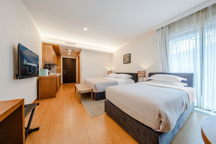 Imagen de la habitación del Hotel Joy Holiday Lijiang. Foto 14