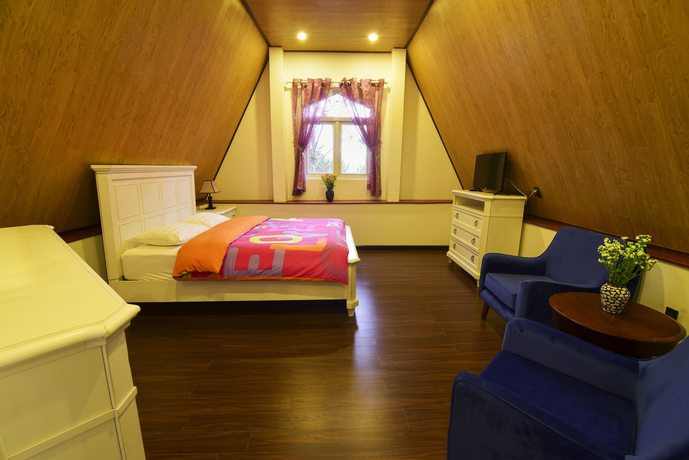 Imagen de la habitación del Hotel Joy Villa. Foto 2