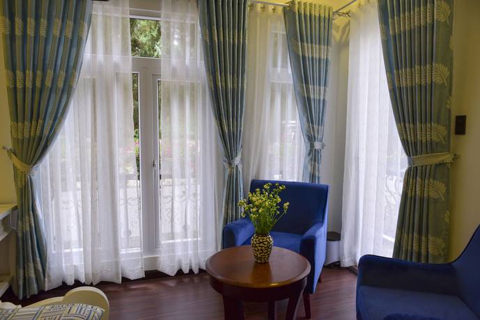 Imagen de la habitación del Hotel Joy Villa. Foto 4