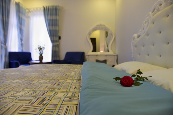 Imagen de la habitación del Hotel Joy Villa. Foto 10