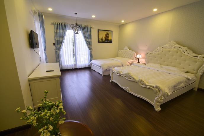 Imagen de la habitación del Hotel Joy Villa. Foto 11