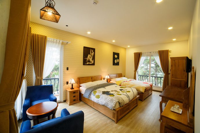 Imagen de la habitación del Hotel Joy Villa. Foto 16