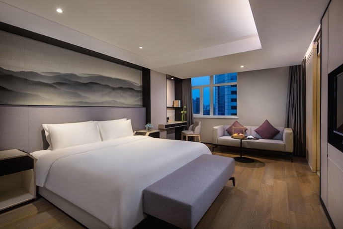 Imagen de la habitación del Hotel Joya Dalian. Foto 5