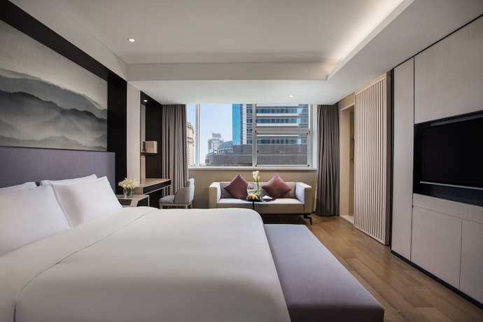 Imagen de la habitación del Hotel Joya Dalian. Foto 6