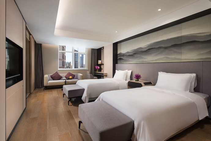 Imagen de la habitación del Hotel Joya Dalian. Foto 9
