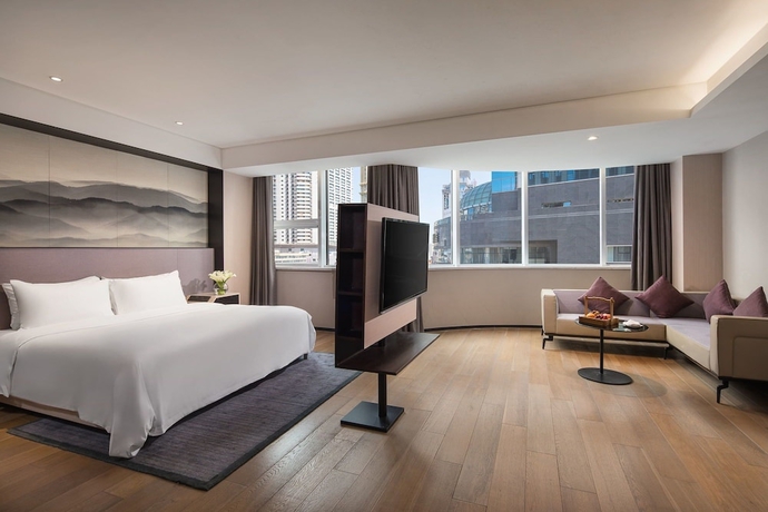Imagen de la habitación del Hotel Joya Dalian. Foto 14