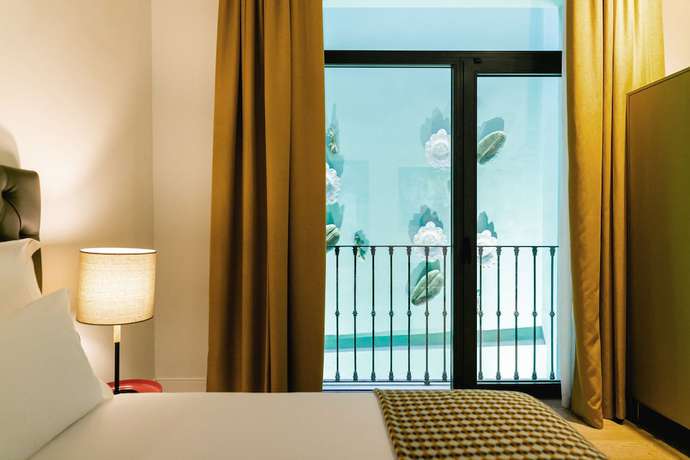Imagen de la habitación del Hotel Joya del Casco Boutique. Foto 3