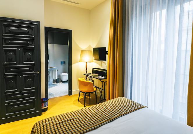 Imagen de la habitación del Hotel Joya del Casco Boutique. Foto 16