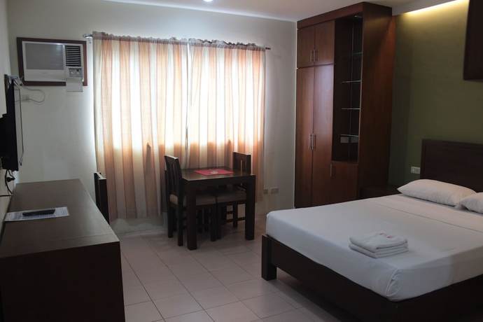 Imagen de la habitación del Hotel Joyce Apartelle Kalentong. Foto 4