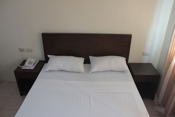 Imagen de la habitación del Hotel Joyce Apartelle Kalentong. Foto 10