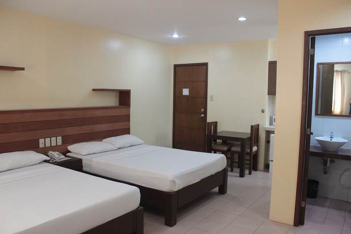 Imagen de la habitación del Hotel Joyce Apartelle Kalentong. Foto 11