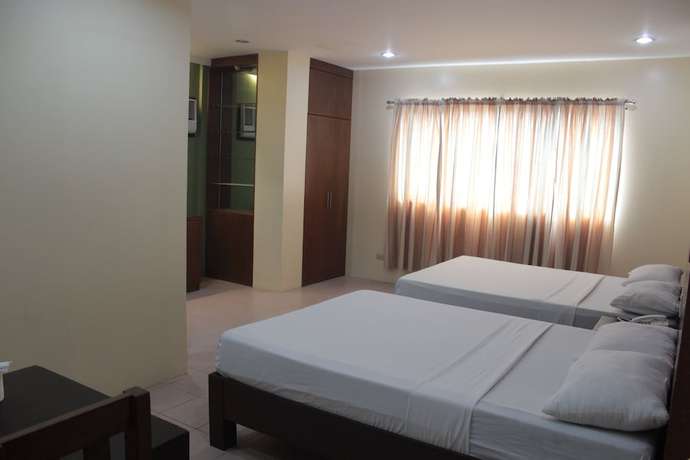 Imagen de la habitación del Hotel Joyce Apartelle Kalentong. Foto 18