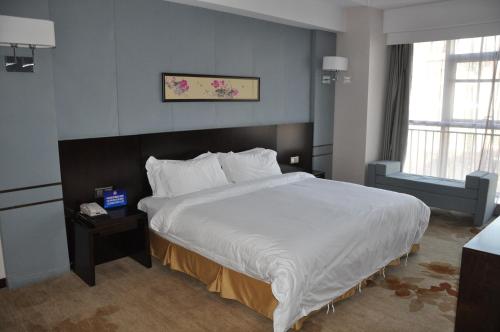 Imagen de la habitación del Hotel Joyful Rose International. Foto 8