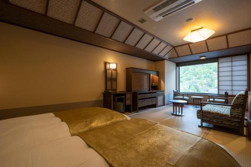 Imagen de la habitación del Hotel Jozankei Onsen Yurakusoan. Foto 18