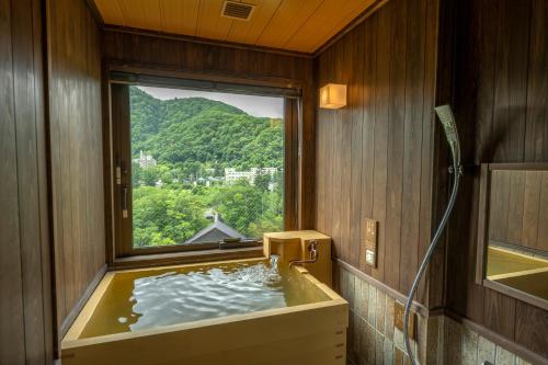 Imagen de la habitación del Hotel Jozankei Onsen Yurakusoan. Foto 19