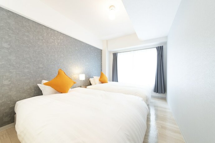 Imagen de la habitación del Hotel Jpride Uemachidai Condo. Foto 19